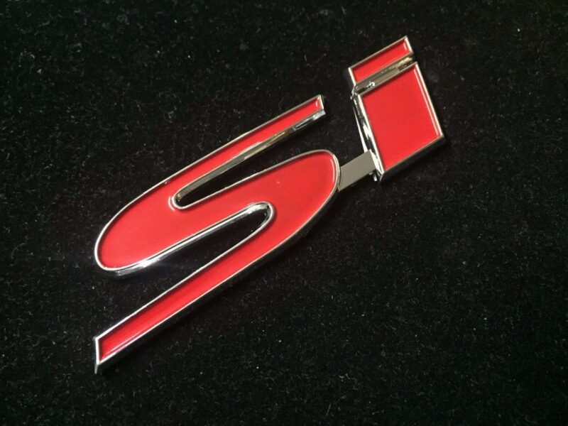EMBLEMA SI